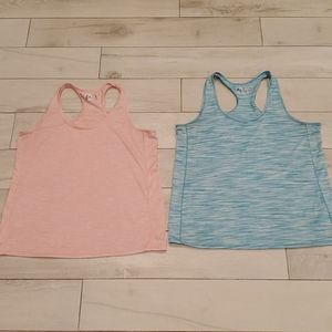 Teal and orange RBX workout tanks